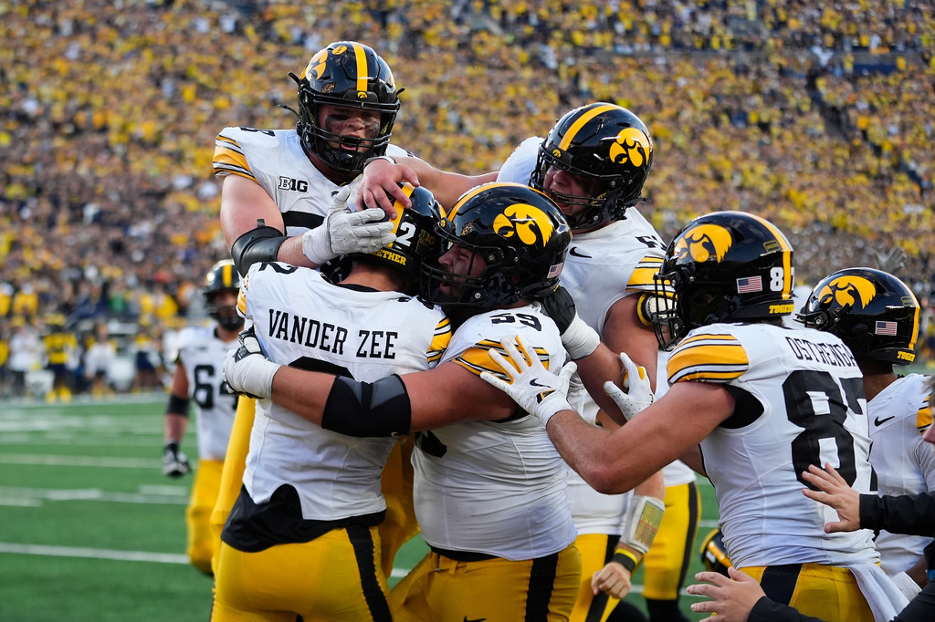 Big Ten schedule has No. 14 Iowa attempting to beat Michigan and Ohio State in back-to-back weeks